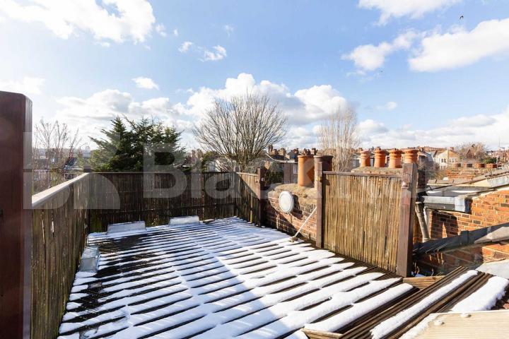 Set over three levels with high ceilings and exposed brickwork Rathcoole Gardens, Crouch End